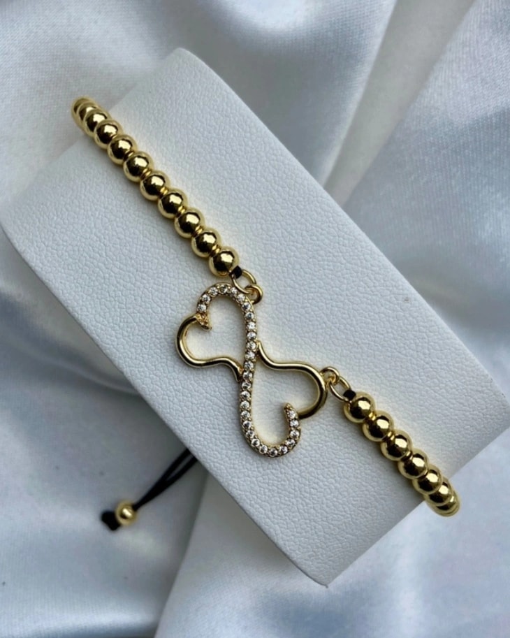 Bracelet féminin en perle doré