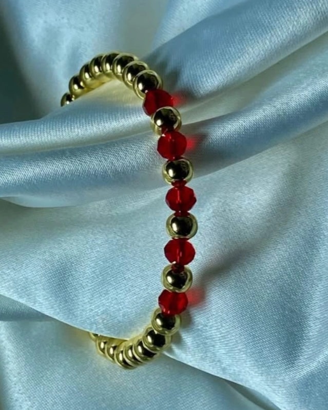 Bracelet féminin en perle doré et rouge