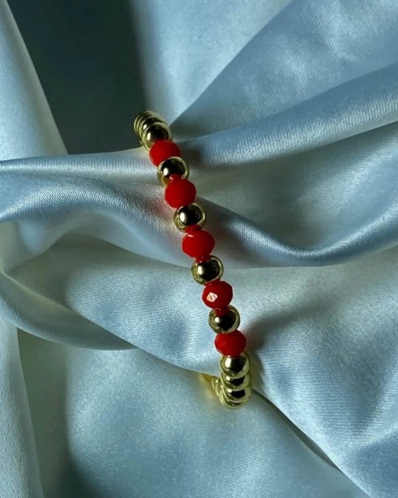 Bracelet féminin en perle orange et doré
